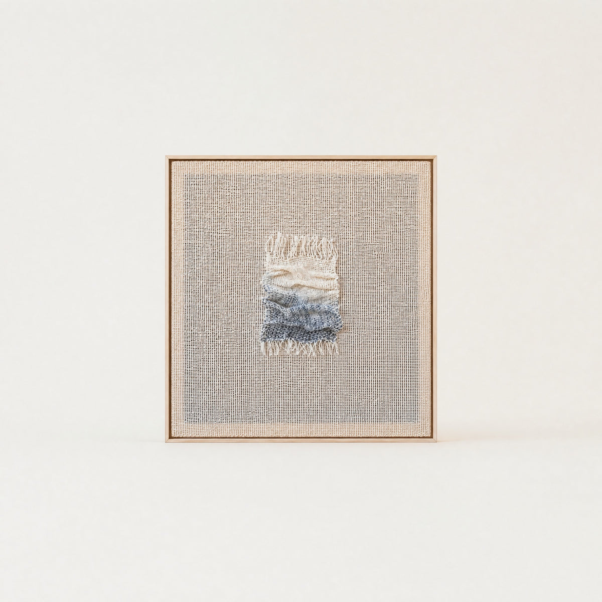 Aestus ocean tide sculptural handwoven two-ply wool tapestry with a soft three-dimensional wave relief in a slim pine frame, framed textile wall art by Lale Studio & Shop
