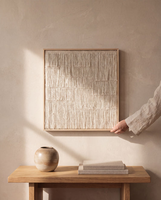 Estheté framed handwoven two-ply wool tapestry in a natural wood frame on a plaster wall, Japandi wall art by Lale Studio & Shop