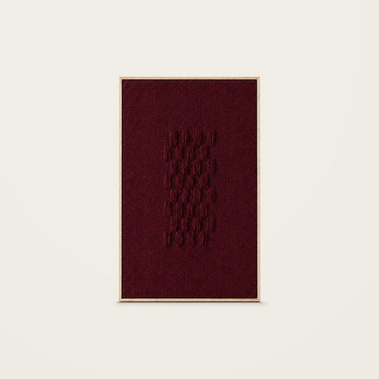 Framed II Wine — burgundy handwoven wool tapestry with raised wool details in a natural wooden frame, front view.