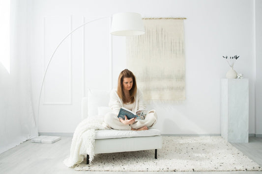 Bruine handwoven wool tapestry shown hanging on a wall