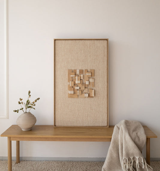 Inlay oak/pine wood-framed wool and oak wall hanging in a styled interior