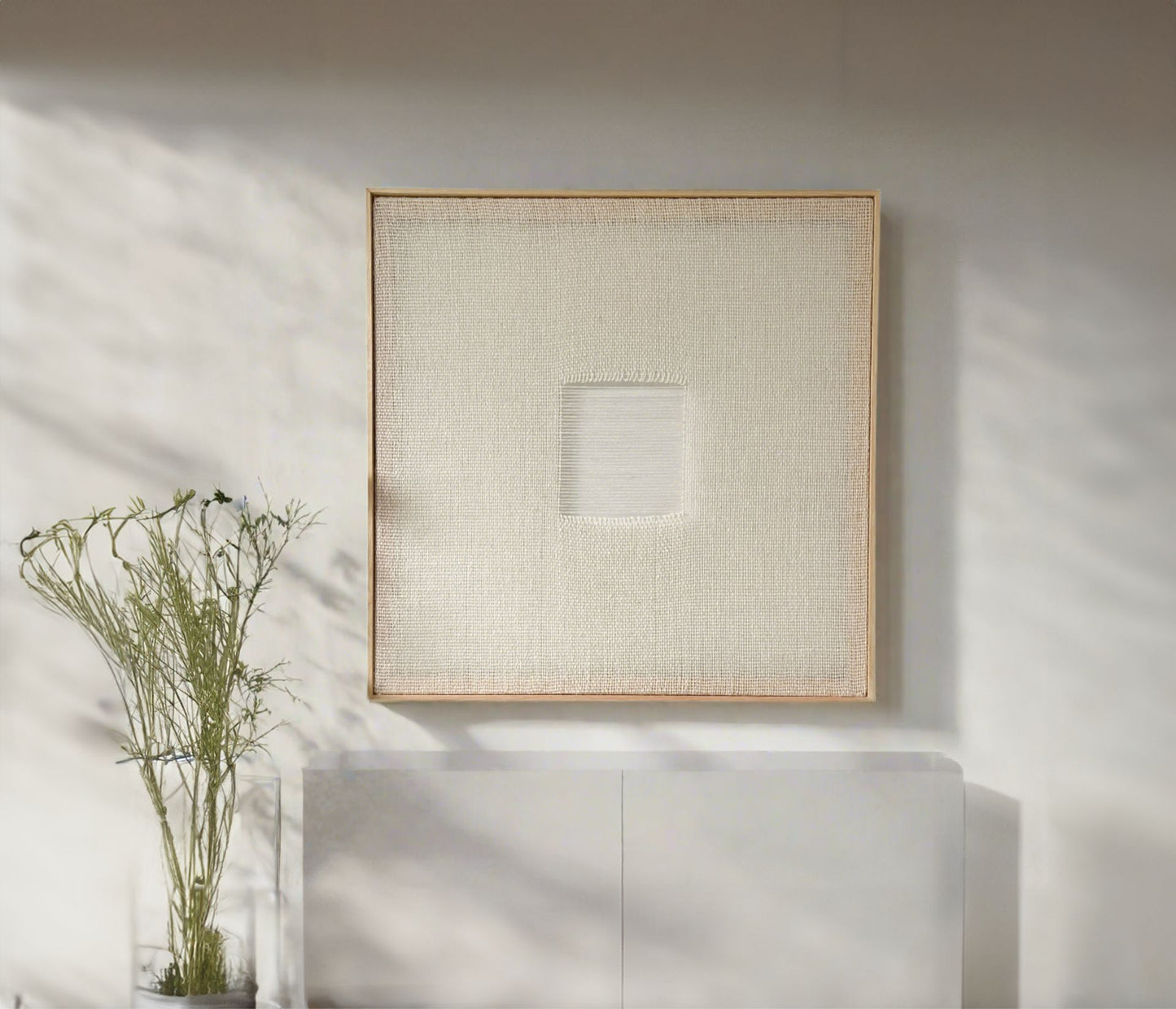 Handwoven Diskuer tapestry made from natural Polish wool, framed in pine, featuring a minimalist design with textured details, perfect for modern and sustainable home decor.