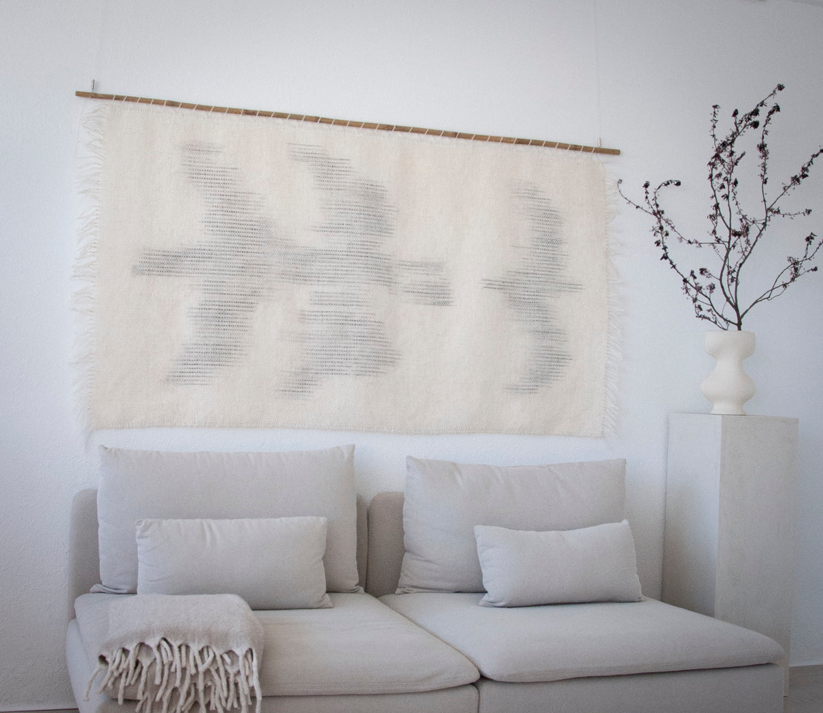 Zeva rod-mounted handwoven wool wall art by Lale Studio & Shop