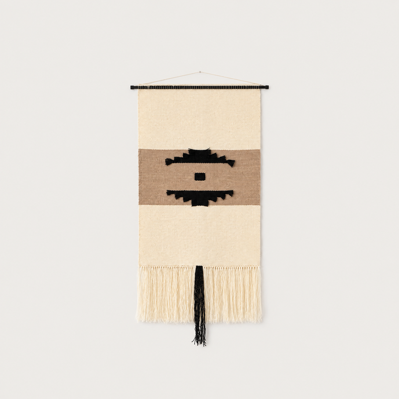 Auroa handwoven wool wall hanging with geometric pattern in black, brown and raw white, packshot, Lale Studio & Shop