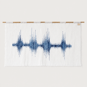 Blue Music handwoven wall hanging with blue soundwave pattern on a bamboo rod, Lale Studio & Shop