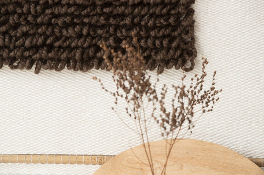 Iam Brown handwoven cotton wall hanging in warm brown tones on a wooden rod, boho textile wall art by Lale Studio & Shop