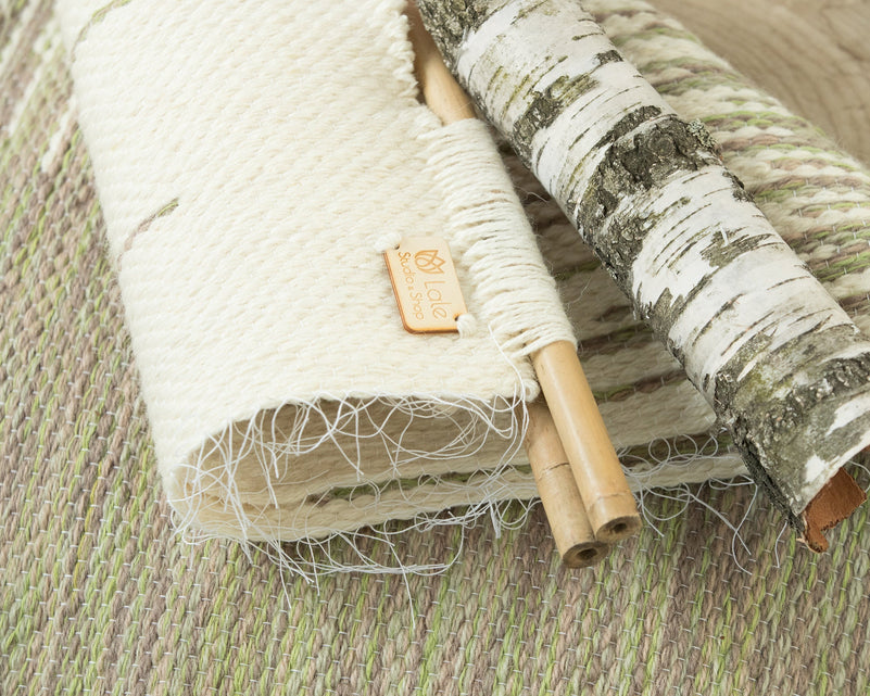 Brzoza woven wall hanging styled in a calm nature-inspired living room