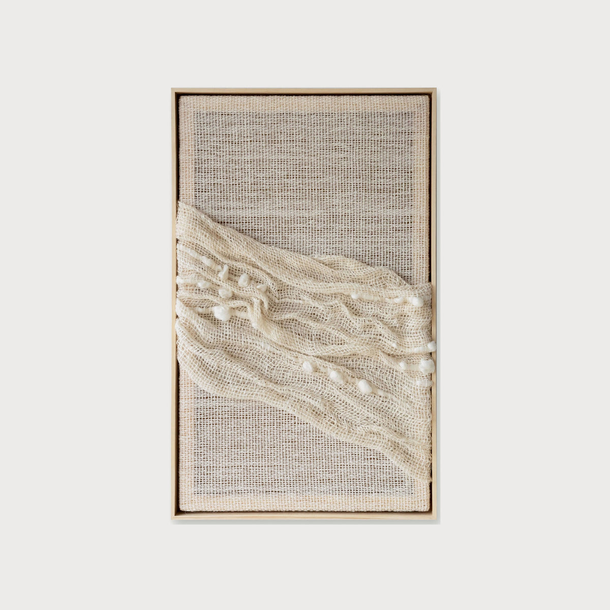 Chal chunky diagonal handwoven two-ply wool textile sculpture in a solid wooden frame by Lale Studio & Shop