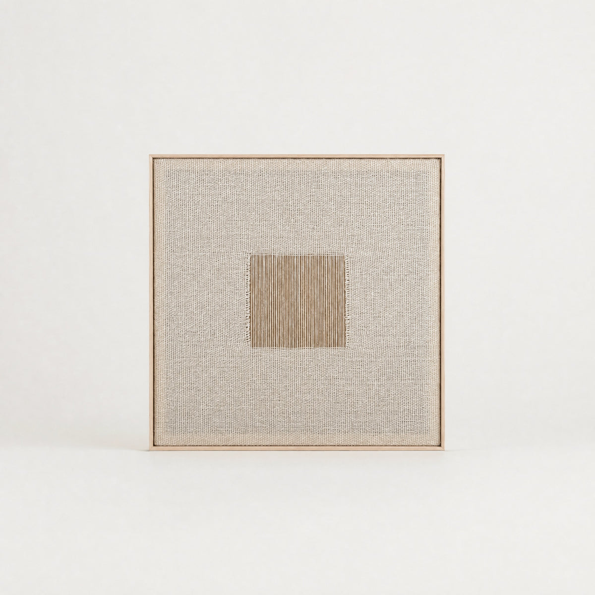 Diskuer square minimalist handwoven two-ply wool tapestry in natural cream tones in a slim pine frame, framed textile wall art by Lale Studio & Shop