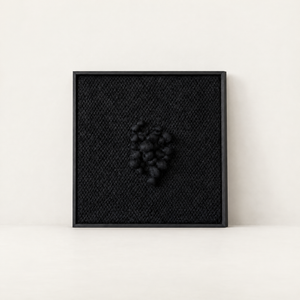 Enigma black sculptural handwoven two-ply wool tapestry in a slim black wood frame, Lale Studio & Shop
