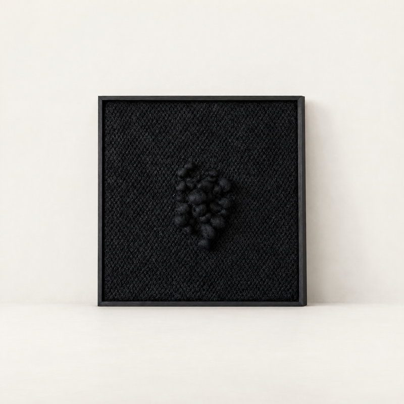 Enigma black sculptural handwoven two-ply wool tapestry in a slim black wood frame, Lale Studio & Shop