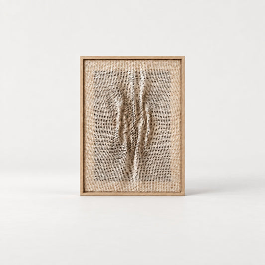 Falla — natural wool tapestry with sculptural folds and dark accents in a wooden frame, front view.