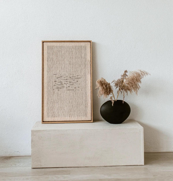 Flun oak/pine wood-framed wool wall hanging in a styled interior