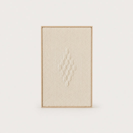 Framed 7 handwoven wool tapestry in soft natural cream with a raised diamond motif in a slim pine frame, framed textile wall art by Lale Studio & Shop
