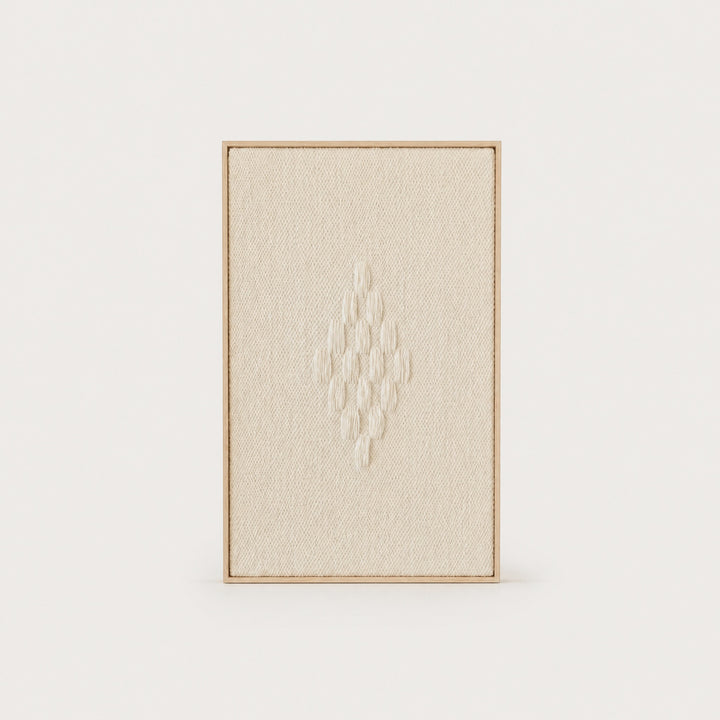 Framed 7 handwoven wool tapestry in soft natural cream with a raised diamond motif in a slim pine frame, framed textile wall art by Lale Studio & Shop