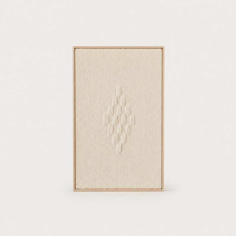 Framed 7 handwoven wool tapestry in soft natural cream with a raised diamond motif in a slim pine frame, framed textile wall art by Lale Studio & Shop