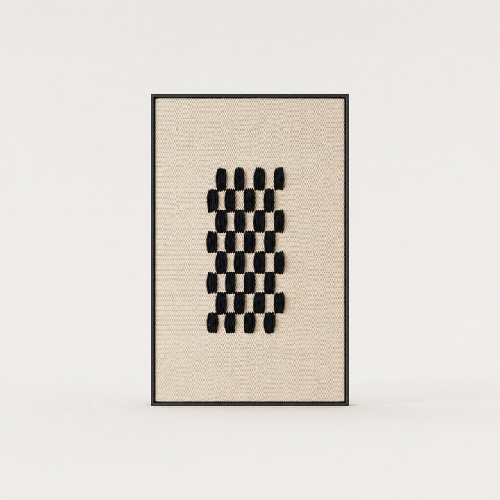 Framed II Black Pattern handwoven two-ply wool tapestry with a deep black geometric grid on a cream ground in a slim pine frame, framed textile wall art by Lale Studio & Shop