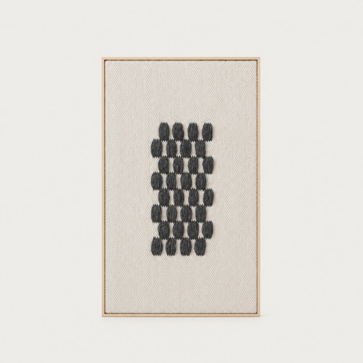 Framed II Gray Pattern handwoven wool tapestry with a charcoal grey geometric grid on a cream ground in a slim pine frame, framed textile wall art by Lale Studio & Shop