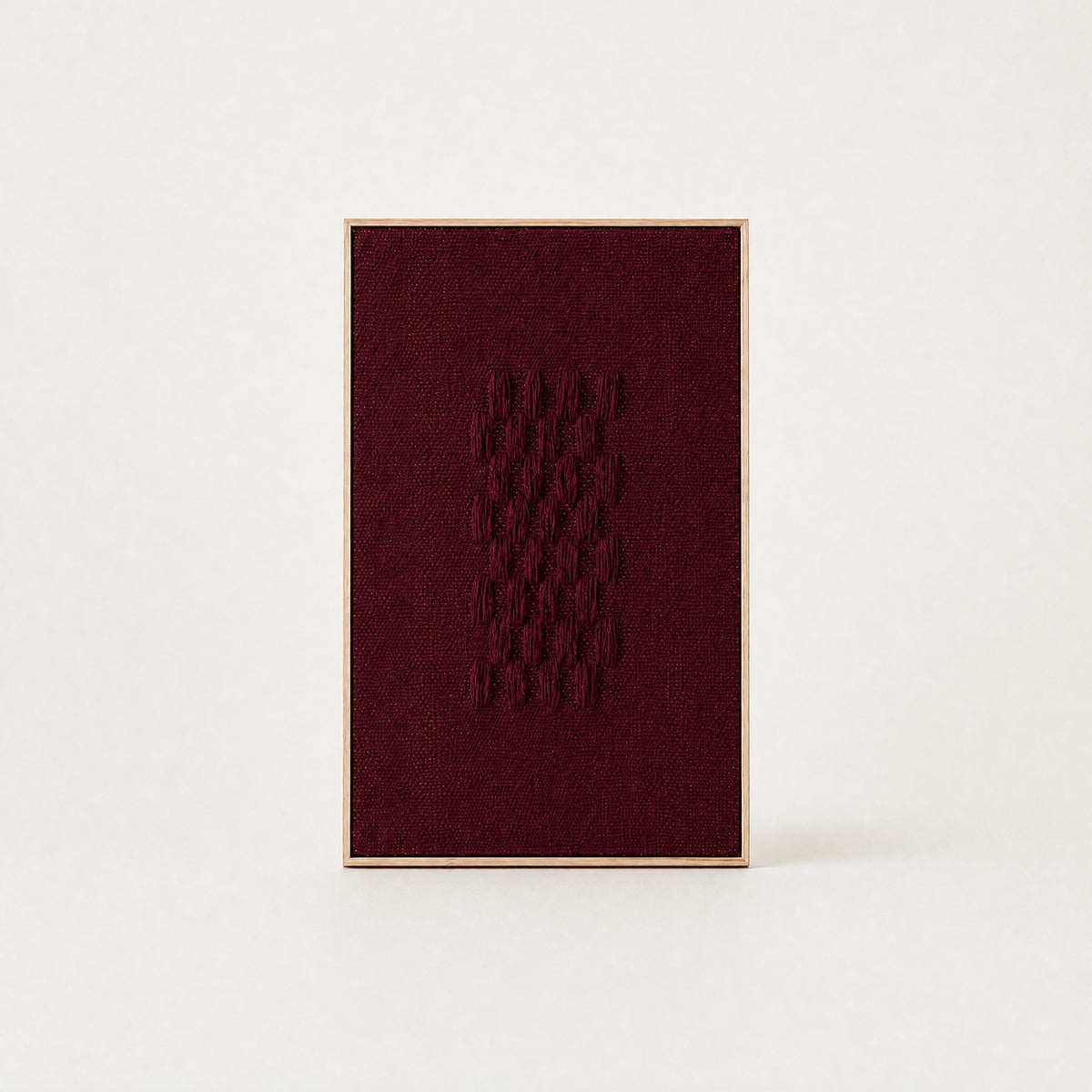 Framed II Wine handwoven two-ply wool tapestry in deep burgundy wine red on natural cream in a slim pine frame, framed textile wall art by Lale Studio & Shop