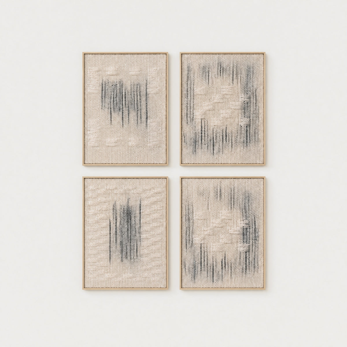 Framed Set, four handwoven two-ply wool tapestries from the Misty weave in slim natural wood frames arranged as a 2x2 gallery set, framed textile wall art by Lale Studio & Shop