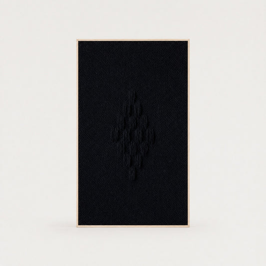 Framed VII Black handwoven two-ply wool tapestry with a raised structured deep black weave in a slim pine frame, framed textile wall art by Lale Studio & Shop