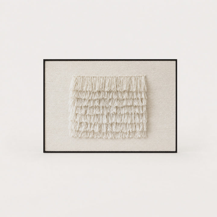 FruFru handwoven wool tapestry in raw white with rows of fluffy fringe on a cream ground in a slim dark walnut frame, framed textile wall art by Lale Studio & Shop