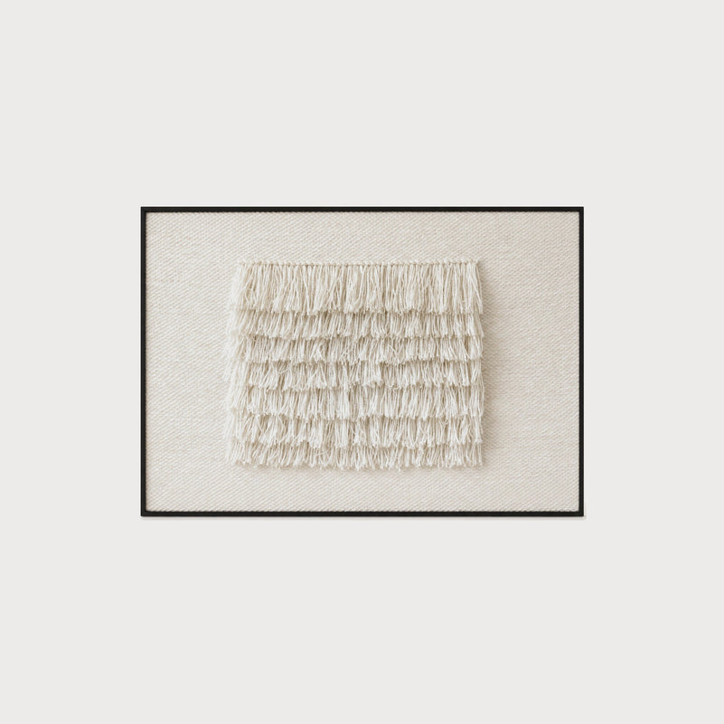 FruFru textured handwoven two-ply wool tapestry in a black frame by Lale Studio & Shop
