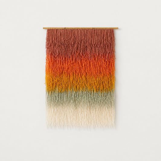 Gerbena handwoven multicolor ombre shaggy wool wall hanging on a bamboo rod, terracotta to sage gradient studio packshot — Lale Studio & Shop