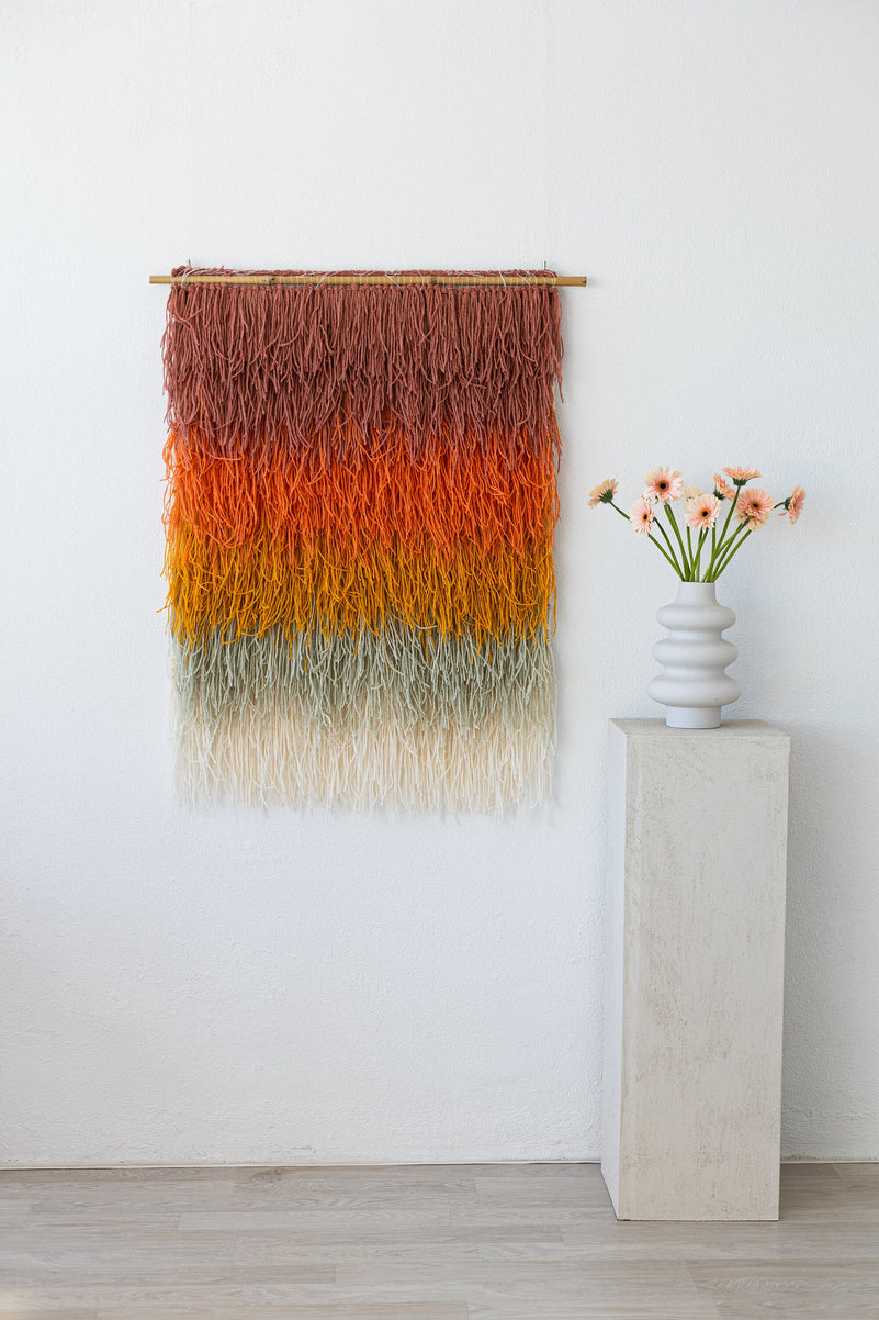 Gerbena multicolor tapestry styled on a wall in a modern boho interior — handwoven wool wall hanging by Lale Studio & Shop