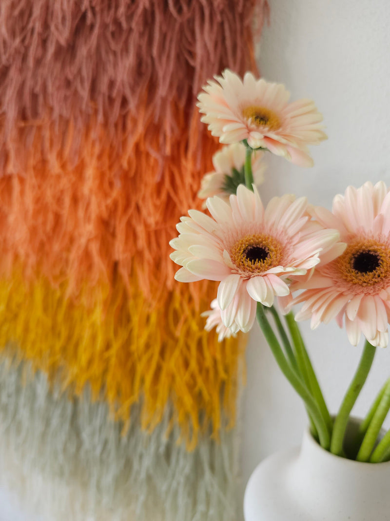 Texture detail of Gerbena's dense wool shag and sunset gradient — handmade fiber art wall hanging by Lale Studio & Shop
