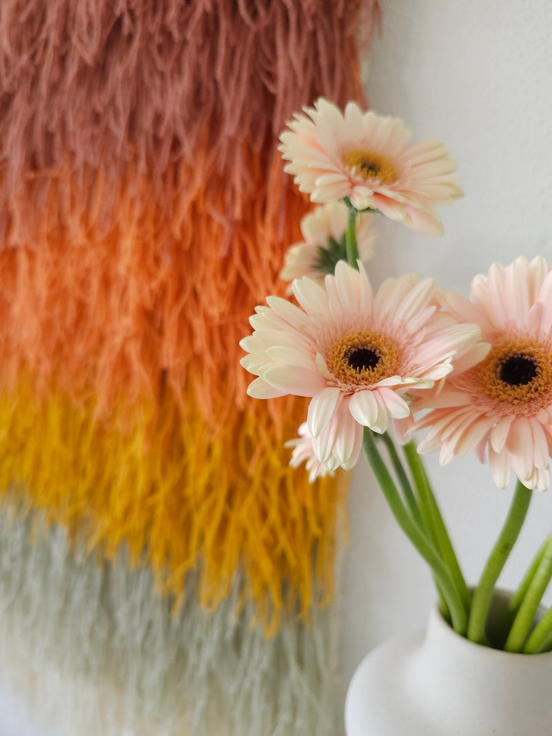 Texture detail of Gerbena's dense wool shag and sunset gradient — handmade fiber art wall hanging by Lale Studio & Shop