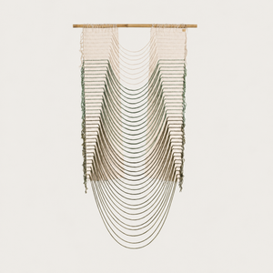 Green Urania handwoven cotton rope wall hanging with cascading semi circles in natural cream and soft green on a bamboo rod, Lale Studio & Shop