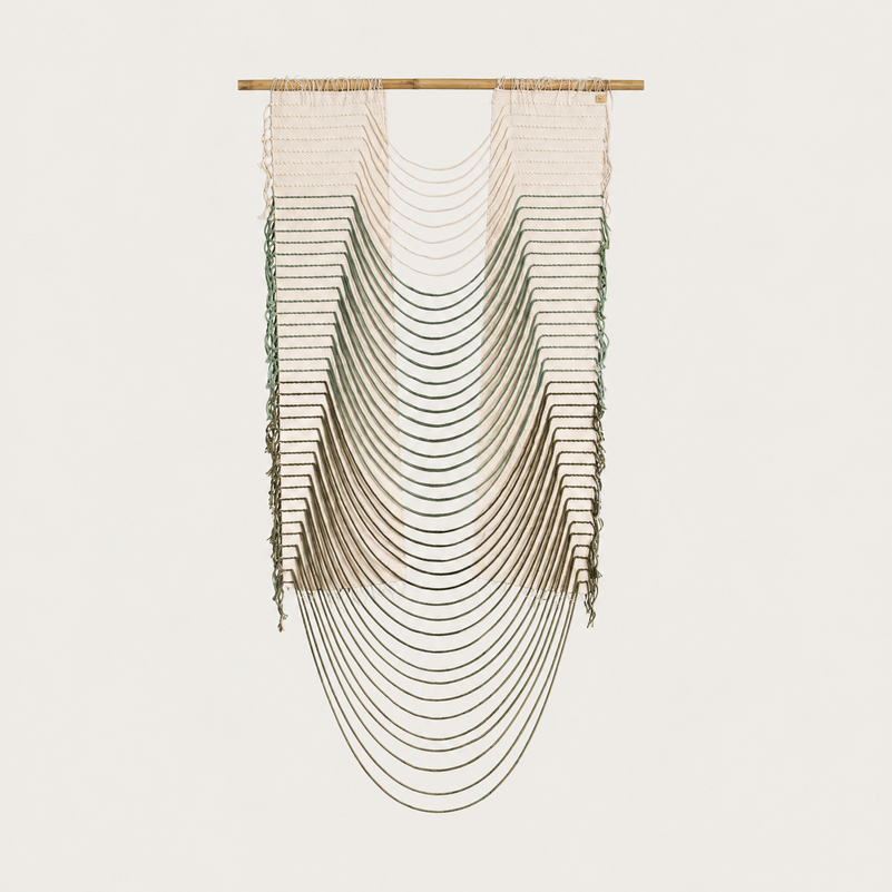 Green Urania handwoven cotton rope wall hanging with cascading semi circles in natural cream and soft green on a bamboo rod, Lale Studio & Shop