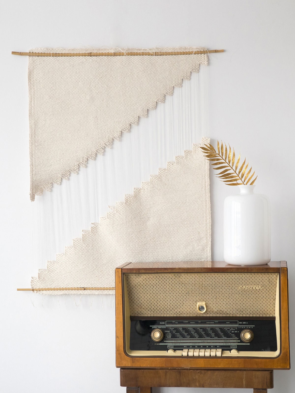 Hagdan cream cotton wall hanging styled in a minimalist japandi entryway with pampas grass — handwoven textile art by Lale Studio & Shop