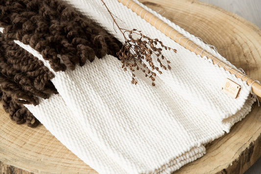 Iam Brown handwoven cotton wall hanging in warm brown tones on a wooden rod, boho textile wall art by Lale Studio & Shop