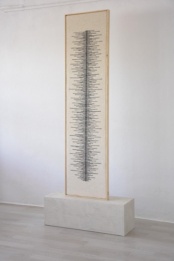 Linea oak/pine wood-framed wool wall hanging in a styled interior