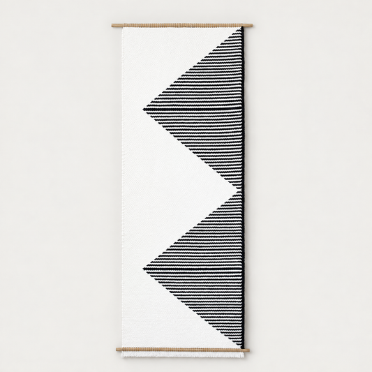 Trian handwoven wall hanging with black and white geometric triangles on bamboo rods, Lale Studio & Shop