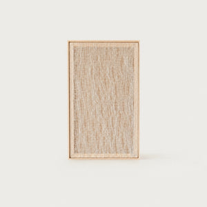 Imperfectio II handwoven wool tapestry in soft beige with a delicate light airy open weave in a slim pine frame, framed textile wall art by Lale Studio & Shop