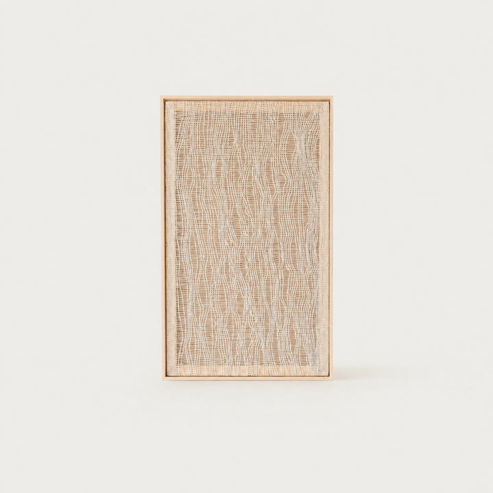 Imperfectio II handwoven wool tapestry in soft beige with a delicate light airy open weave in a slim pine frame, framed textile wall art by Lale Studio & Shop