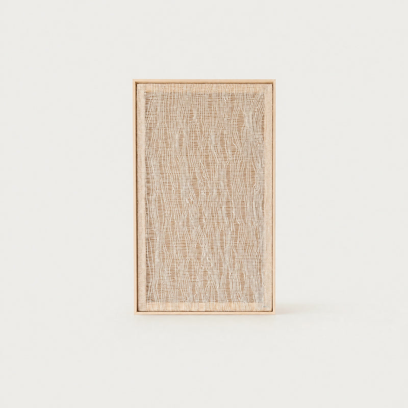 Imperfectio II handwoven wool tapestry in soft beige with a delicate light airy open weave in a slim pine frame, framed textile wall art by Lale Studio & Shop