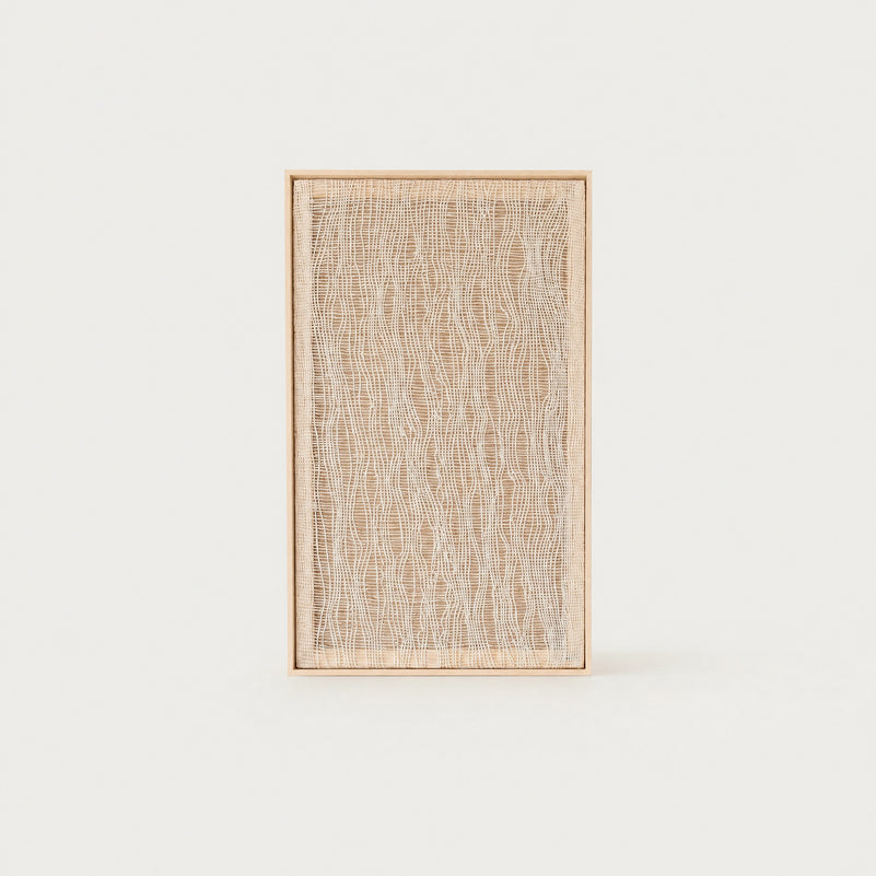 Imperfectio II handwoven wool tapestry in soft beige with a delicate light airy open weave in a slim pine frame, framed textile wall art by Lale Studio & Shop
