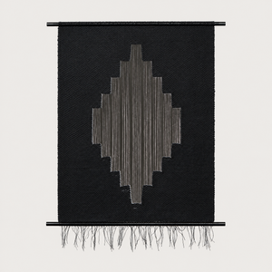 Lohe handwoven black cotton wall hanging with a stepped diamond motif on slim black metal rods, Lale Studio & Shop
