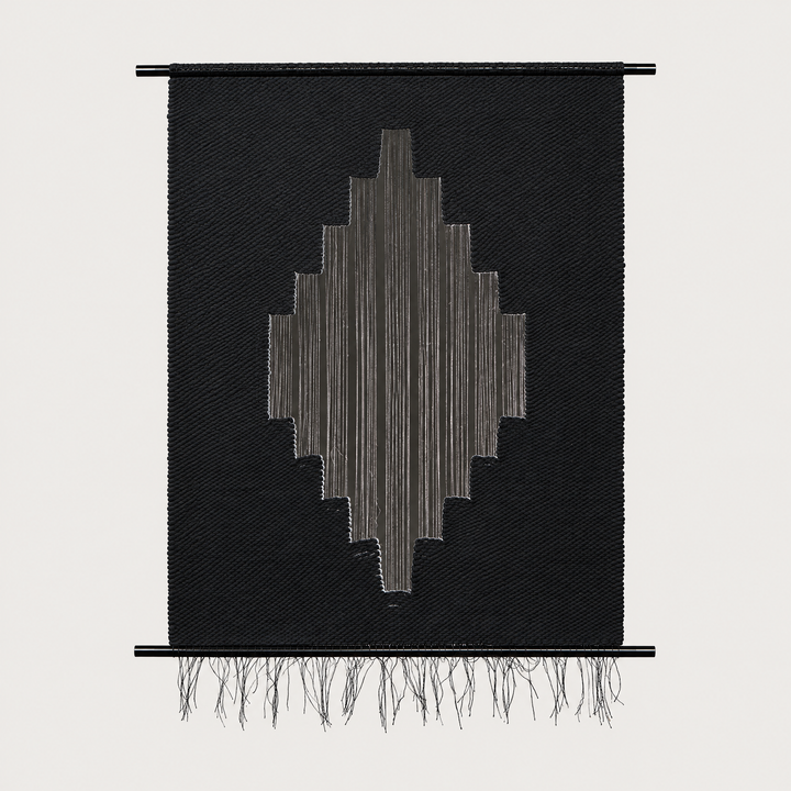 Lohe handwoven black cotton wall hanging with a stepped diamond motif on slim black metal rods, Lale Studio & Shop