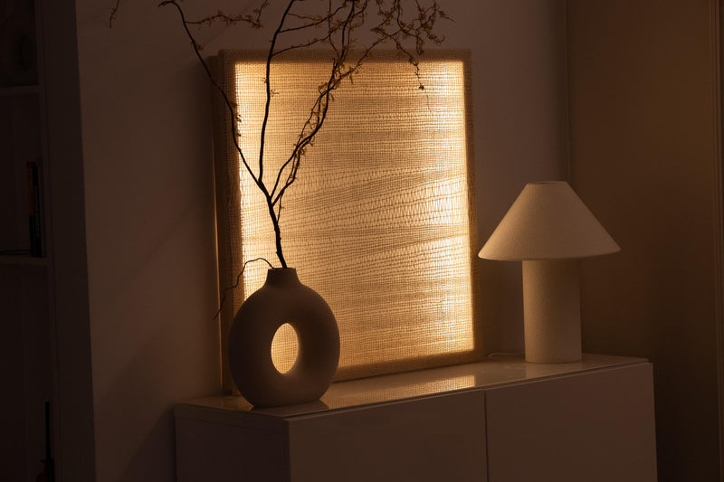 Wide interior photograph of Ma working as both a handwoven artwork and an ambient light source