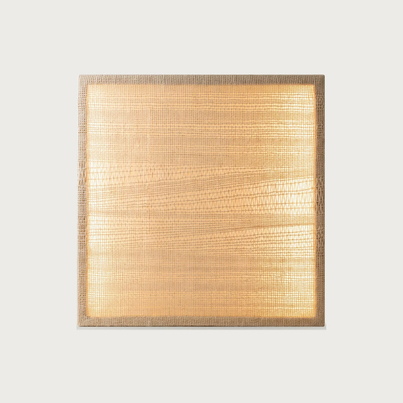 Ma illuminated handwoven two-ply wool tapestry glowing with warm ambient light in a solid wooden frame by Lale Studio & Shop