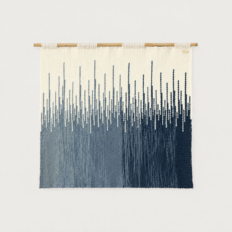 Maris handwoven wool wall hanging, natural and blue zigzag weave on bamboo rod, packshot, Lale Studio & Shop