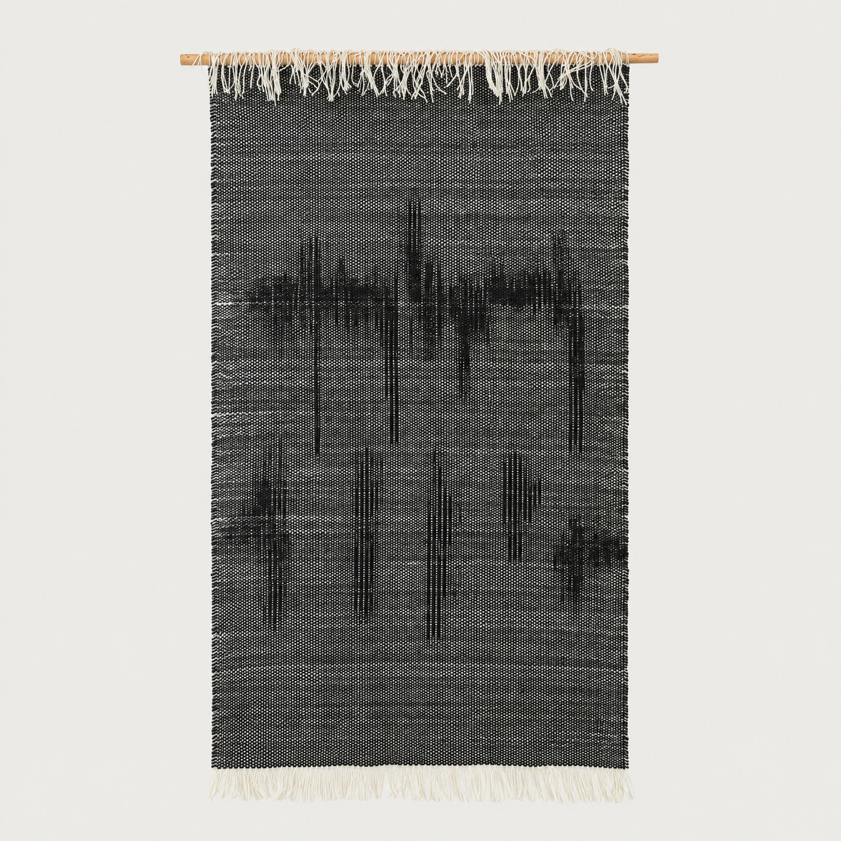 Misty Ink handwoven charcoal wool wall hanging on bamboo rod, packshot, Lale Studio & Shop