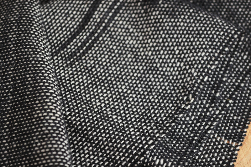 Misty Ink tapestry on a light wall for contrast, modern interior
