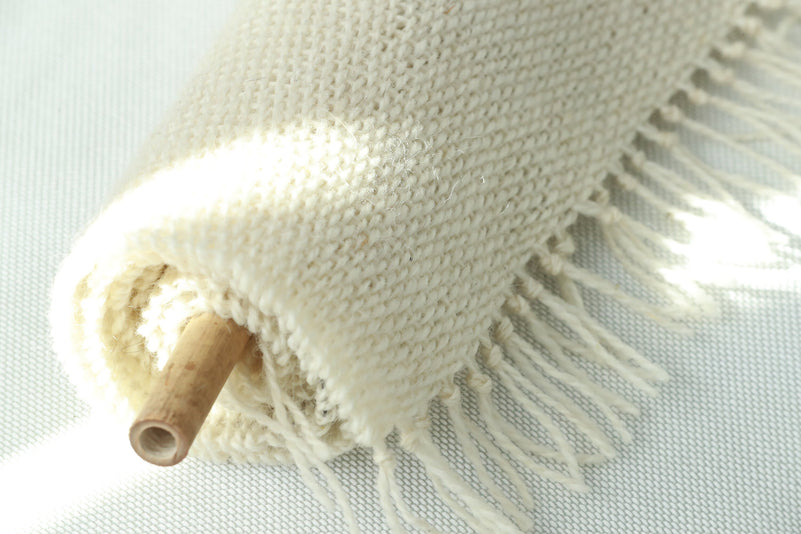 Close view of Misty Pearl's pearlescent handwoven surface