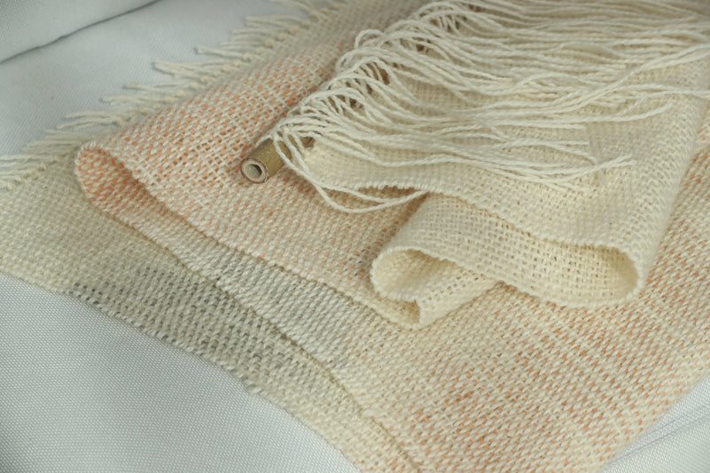 Misty Pearl textile art detail showing grey and rust accents